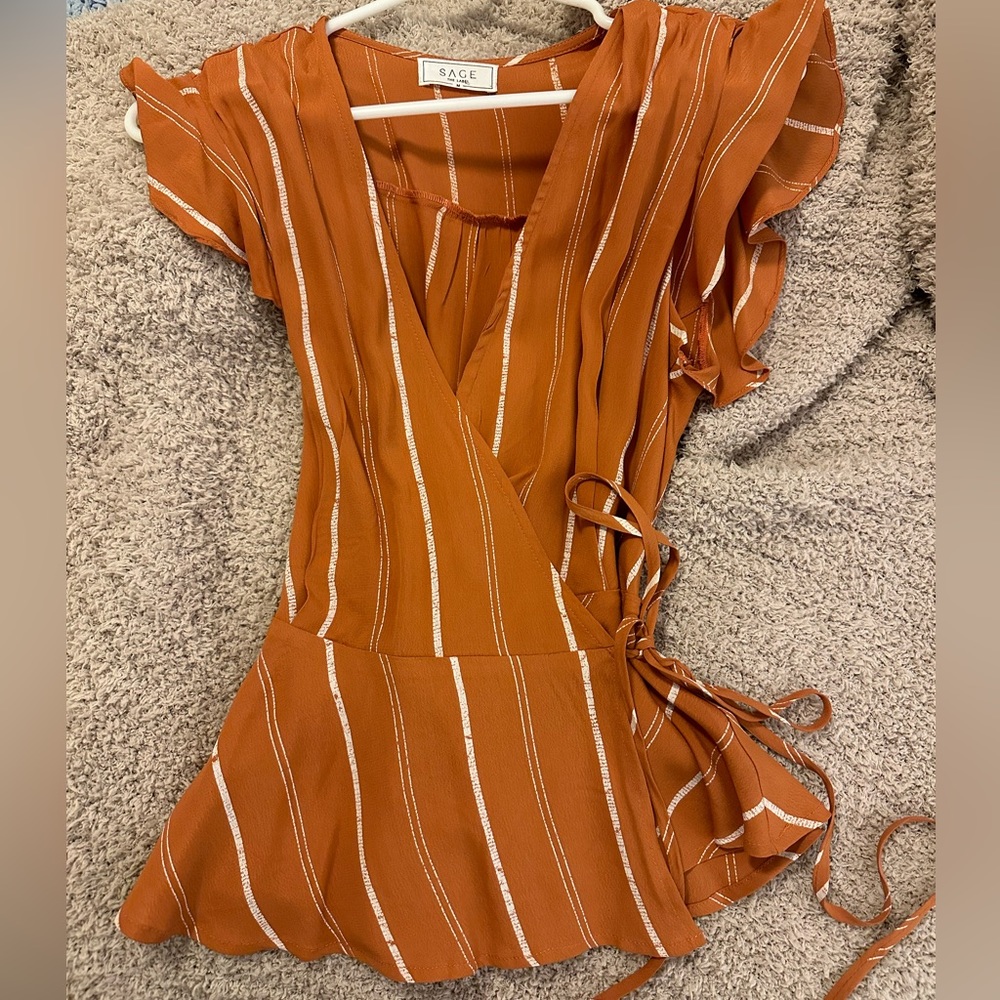 burnt orange striped wrapped blouse
